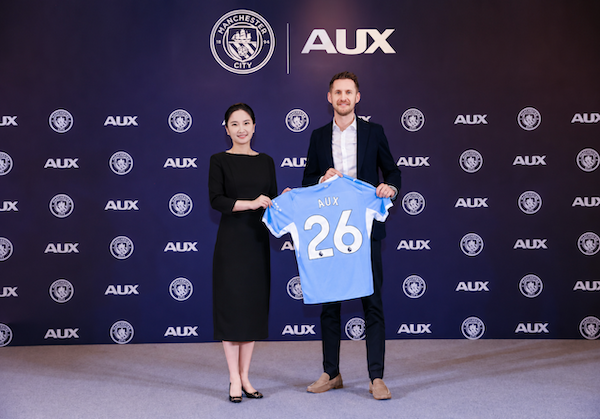 AUX signs global partnership with Manchester City