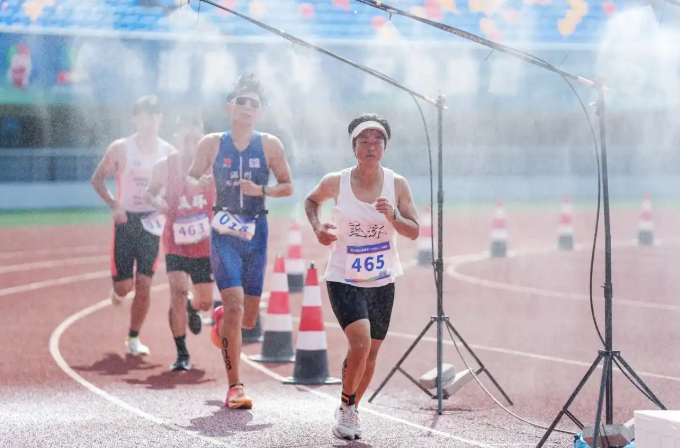 Zhejiang sports congress shows yoga, triathlon events in Taizhou