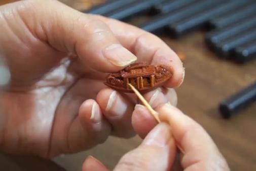 Explore exquisite carving art at Jinhua's nut carving museum