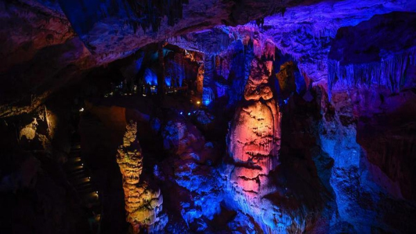 Tourists visit Yaolin karst cave in Tonglu County, China's Zhejiang