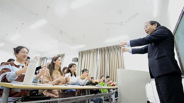 Why does the sign language song become a favorite among CUZ students?