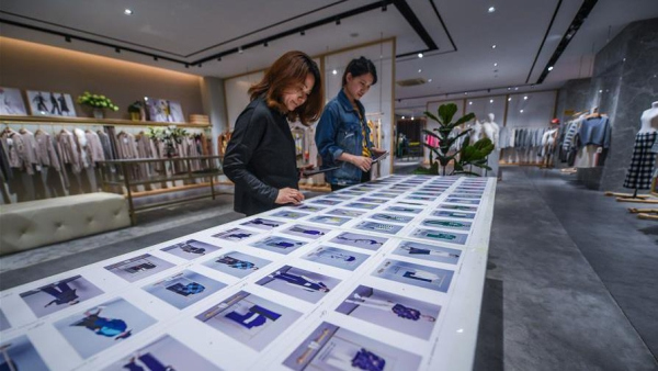 Zhejiang's Puyuan dubbed as largest trading center for woolen sweater in China