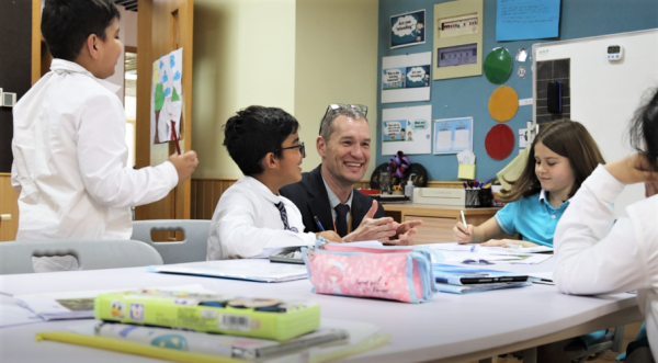 What made Principal Robert fall in love with this ever-changing city?