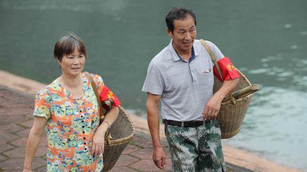 A couple who have been the waterkeepers of Duihekou Reservior for 30 years
